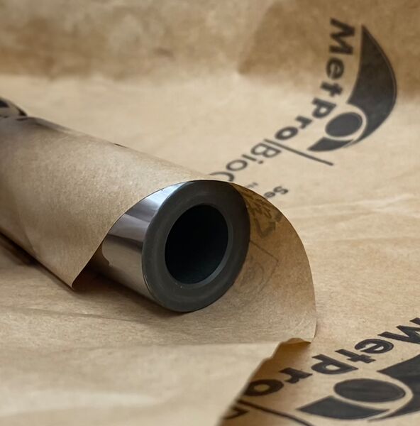 A metal cylinder is wrapped in BioCor® smooth paper to protect it from corrosion.